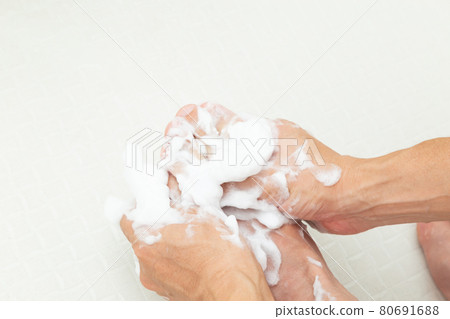 Men washing their feet Men washing their feet 80691688