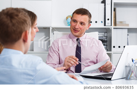 Consultation with school headmaster 80693635