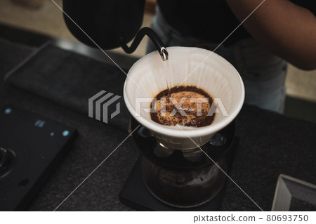 barista dripping coffee and slow coffee bar style barista dripping coffee and slow coffee bar style 80693750