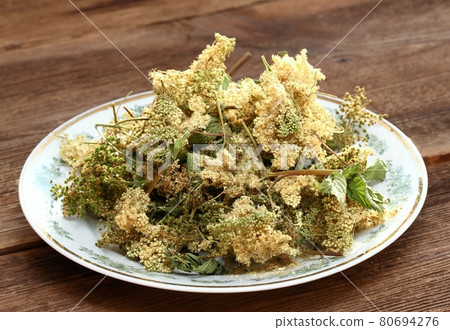 Dried Filipendula ulmaria,  commonly known as meadowsweet or mead wort. 80694276