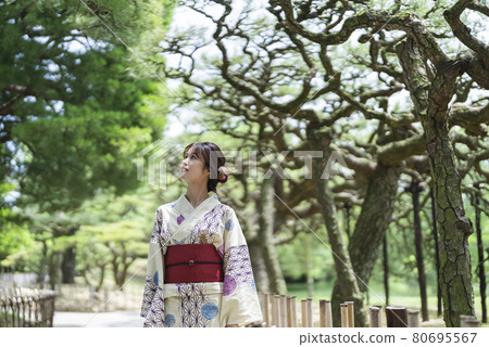 A woman in a yukata A woman in a yukata 80695567