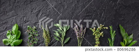 Fresh aromatic herbs panoramic banner with copy space, overhead 80696286