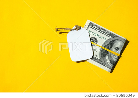 Dollar banknote with paper note for copy space. Savings investment, Salary. Finance concept. Business budget of wealth Dollar banknote with paper note for copy space. Savings investment, Salary. Finance concept. Business budget of wealth 80696349