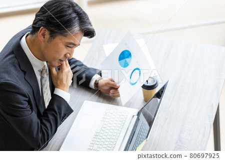 Businessman in desk work Businessman in desk work 80697925