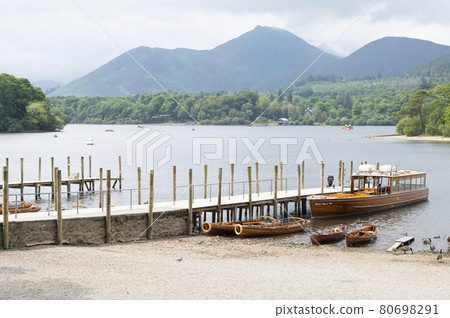 Keswick, English Lake District, U.K. 28 July, 2021. Beautiful view of the lake, bridge and boats, best travel place in U.K 80698291