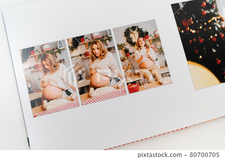 pages of photobook from photo shoot pregnancy on New Year's Day 80700705