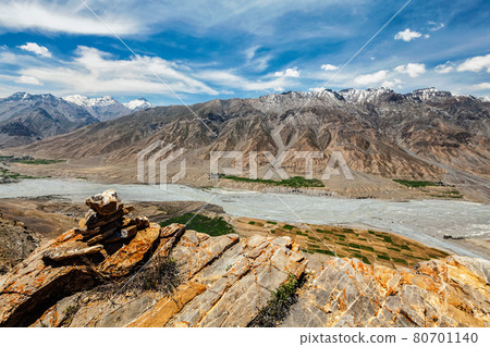 View of Spiti valley Himalayas with stone cairn . Spiti valley, Himachal Pradesh, India View of Spiti valley Himalayas with stone cairn . Spiti valley, Himachal Pradesh, India 80701140