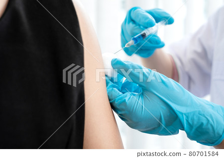 Male doctors vaccinated with syringes to prevent epidemics at hospitals, health care, and medical concepts Male doctors vaccinated with syringes to prevent epidemics at hospitals, health care, and medical concepts 80701584