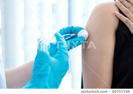 Male doctors vaccinated with syringes to prevent epidemics at hospitals, health care, and medical concepts Male doctors vaccinated with syringes to prevent epidemics at hospitals, health care, and medical concepts 80701586