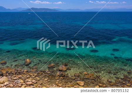 The clear and blue waters of Mediterranean sea in the Saronic gulf, Greece. The clear and blue waters of Mediterranean sea in the Saronic gulf, Greece. 80705132