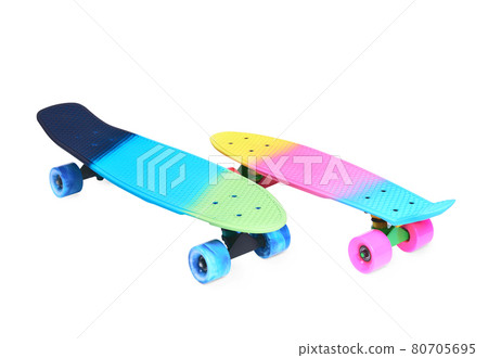 Two rainbow plastic Penny board skateboards on white background Two rainbow plastic Penny board skateboards on white background 80705695