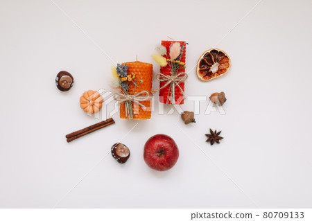 Autumn home decor with candles on white background top view. Cozy fall composition. Happy thanksgiving concept.  80709133