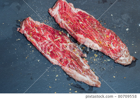 Raw wagyu meat gold label 9+ top view, ready to be cooked. 80709558