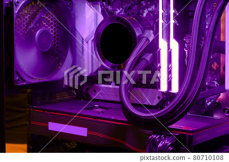 Close-up and inside high performance Desktop and cooling system on CPU socket with LED RGB light show status on working, interior on Computer PC Case and DIY, technology background 80710108