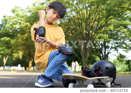 Boy wearing a protector Boy wearing a protector 80714758