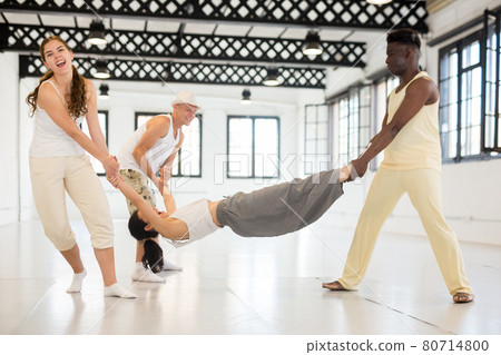 Modern ballet dancers doing lifting pose Modern ballet dancers doing lifting pose 80714800