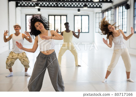Asian woman studying movement of contemporary dance 80717166