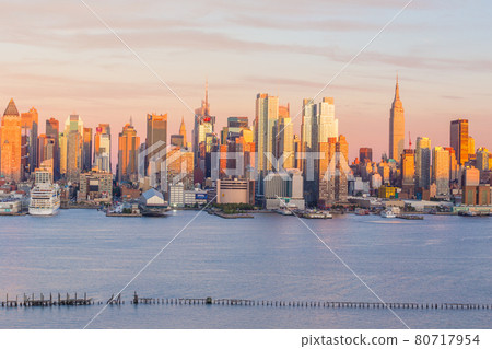 New York City midtown Manhattan sunset skyline panorama view over Hudson River 80717954