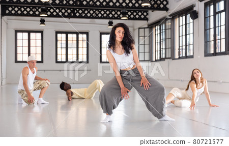 Asian woman studying movement of contemporary dance Asian woman studying movement of contemporary dance 80721577