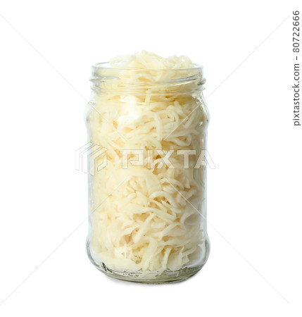Glass jar of tasty fermented cabbage isolated on white 80722666