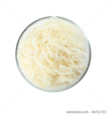 Glass bowl of tasty fermented cabbage isolated on white, top view 80722731