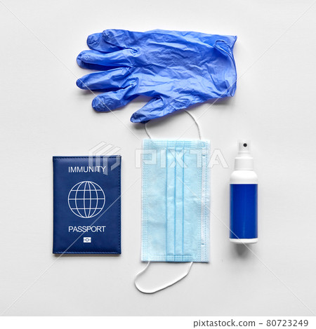 immunity passport, mask, gloves and hand sanitizer immunity passport, mask, gloves and hand sanitizer 80723249