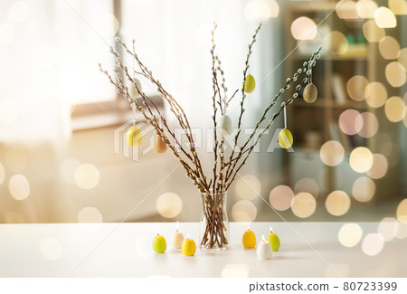 pussy willow branches decorated by easter eggs 80723399