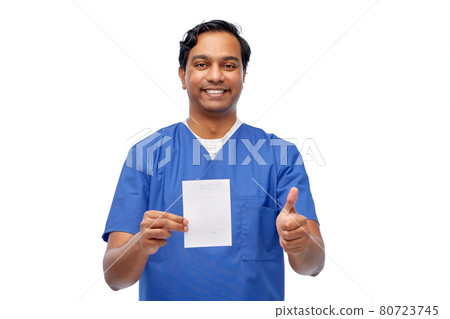 indian doctor with prescription showing thumbs up 80723745