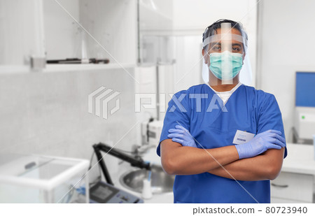 indian male doctor in mask and face shield indian male doctor in mask and face shield 80723940