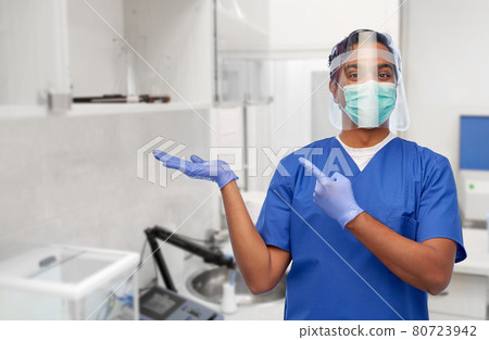 indian male doctor in mask and face shield indian male doctor in mask and face shield 80723942