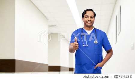 indian doctor or male nurse showing thumbs up 80724128