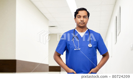 indian doctor or male nurse with stethoscope indian doctor or male nurse with stethoscope 80724209