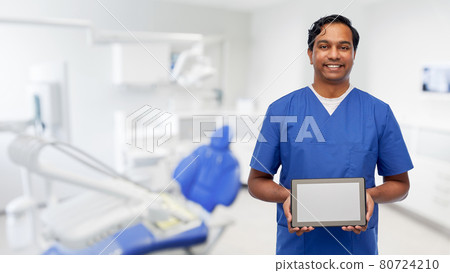 doctor or male dentist showing tablet computer doctor or male dentist showing tablet computer 80724210