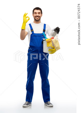 male cleaner with cleaning supplies showing ok male cleaner with cleaning supplies showing ok 80724374