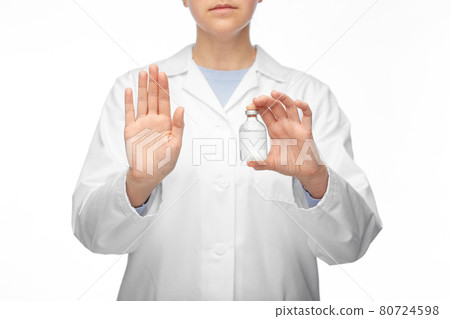 close up of doctor with syringe shows stop gesture close up of doctor with syringe shows stop gesture 80724598