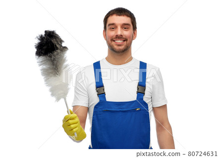 happy male worker or cleaner with duster cleaning happy male worker or cleaner with duster cleaning 80724631