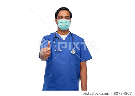 indian male doctor in mask showing thumbs up indian male doctor in mask showing thumbs up 80724807