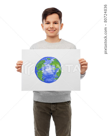 smiling boy holding drawing of earth planet 80724836