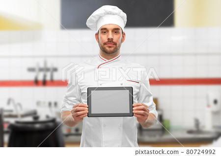 male chef showing tablet pc at restaurant kitchen male chef showing tablet pc at restaurant kitchen 80724992