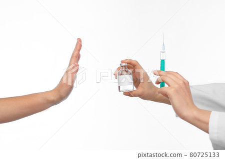 hand with medicine and showing stop gesture hand with medicine and showing stop gesture 80725133
