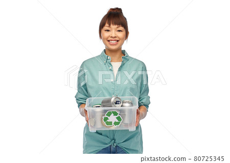 smiling young asian woman sorting metallic waste smiling young asian woman sorting metallic waste 80725345