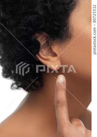 close up of african american woman's ear close up of african american woman's ear 80725532