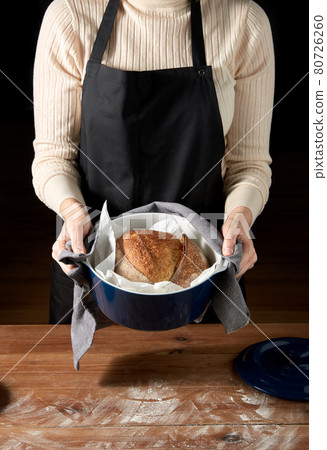 female baker with homemade bread at bakery female baker with homemade bread at bakery 80726260