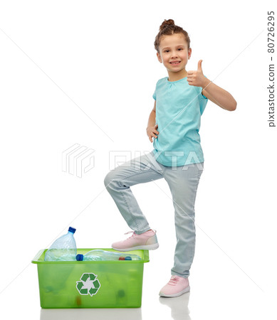 girl sorting plastic waste and showing thumbs up girl sorting plastic waste and showing thumbs up 80726295