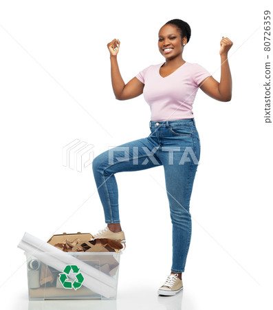 happy african american woman sorting paper waste 80726359