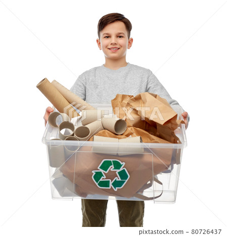 smiling boy sorting paper waste smiling boy sorting paper waste 80726437