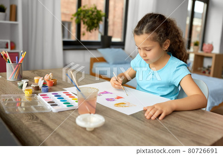 little girl with colors drawing picture at home little girl with colors drawing picture at home 80726691