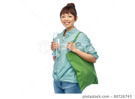 woman with bag for food shopping and glass bottle 80726743