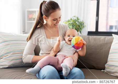 happy smiling mother with little baby at home 80726767