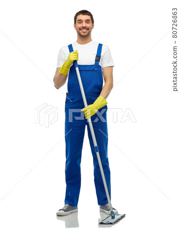 male cleaner in overall cleaning floor with mop 80726863